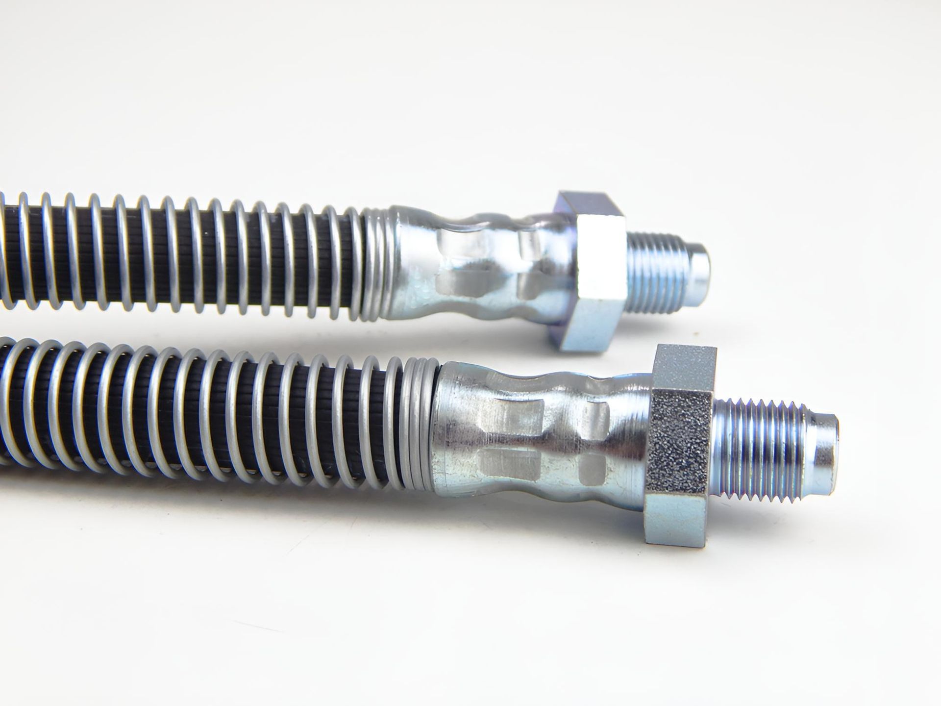 A Close Up Of Two Brake Hoses — Action Hose & Fitting Solutions In Brisbane, QLD