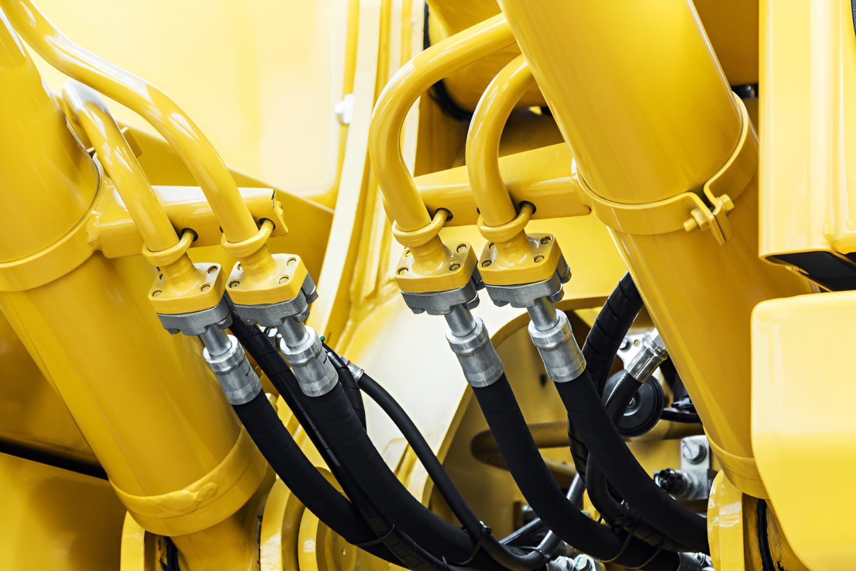 A Close Up Of Hydraulic Hoses — Action Hose & Fitting Solutions In Loganholme, QLD