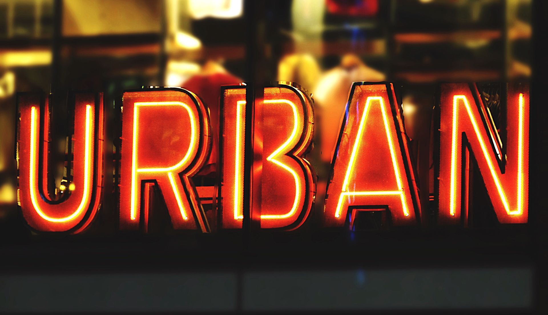A neon sign that says urban on it