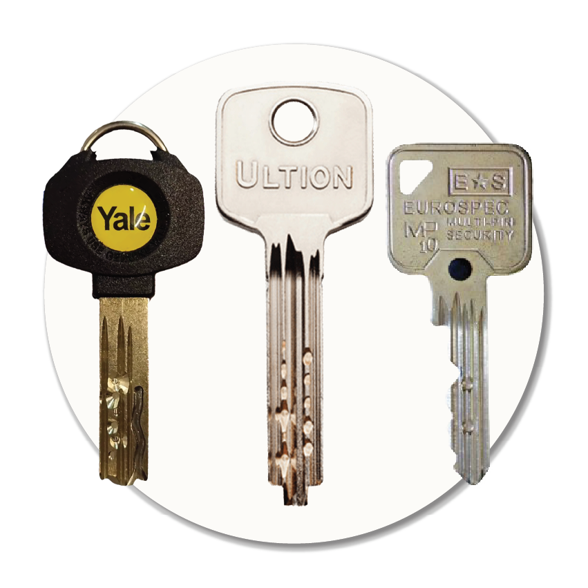 Image showing Yale, Ultion and Eurospec dimple and security keys representing office and high-security key cutting services in Stockport, done in moments.