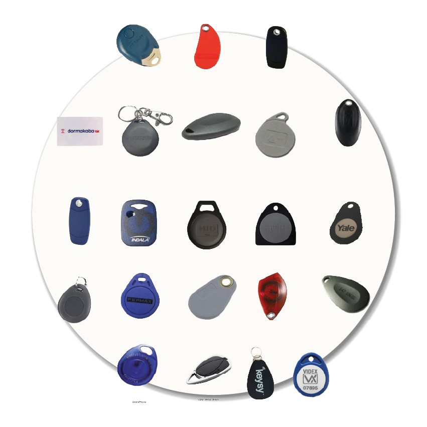 Array of common RFID and proximity key fobs and tags arranged on a white circular background, showing the many types Sole to Sole can copy.
