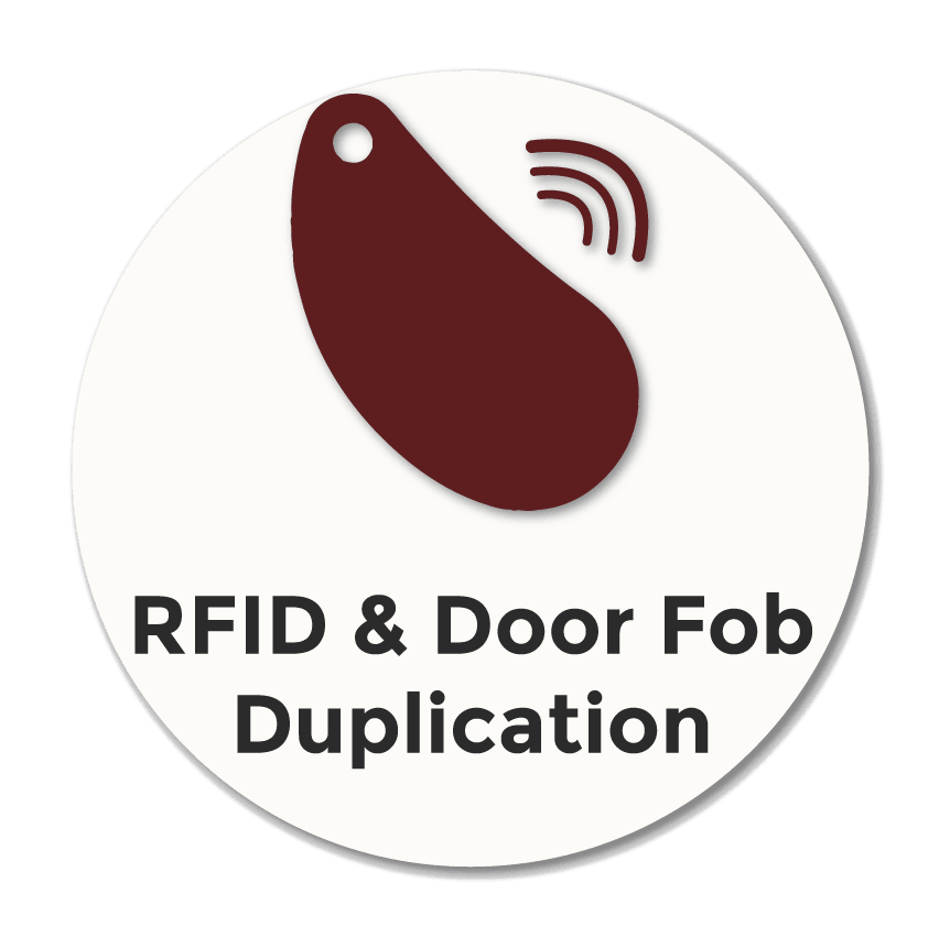 Icon of an RFID key fob representing RFID cloning and door fob duplication services for electronically accessed doors, alarm systems and roller shutters in Stockport.