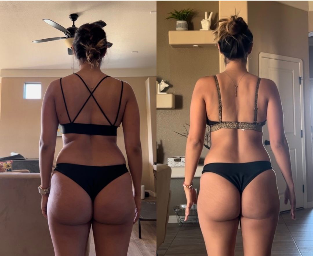 A woman in a bikini is standing in a living room