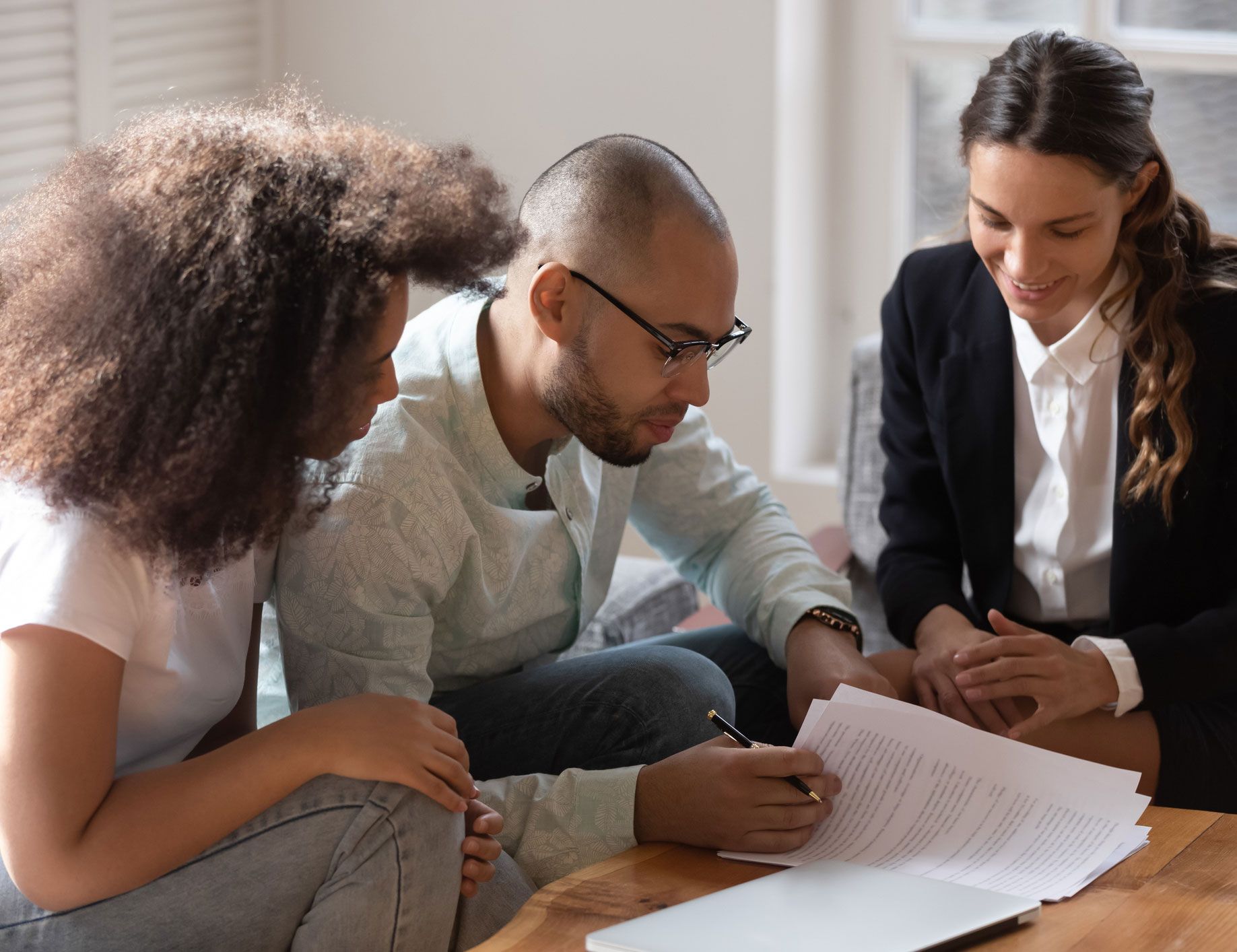 Couple Signing Prenuptial Agreement Papers — Fairlawn, OH — Susan Lax Law Office Couple Signing Prenuptial Agreement Papers — Fairlawn, OH — Susan Lax Law Office