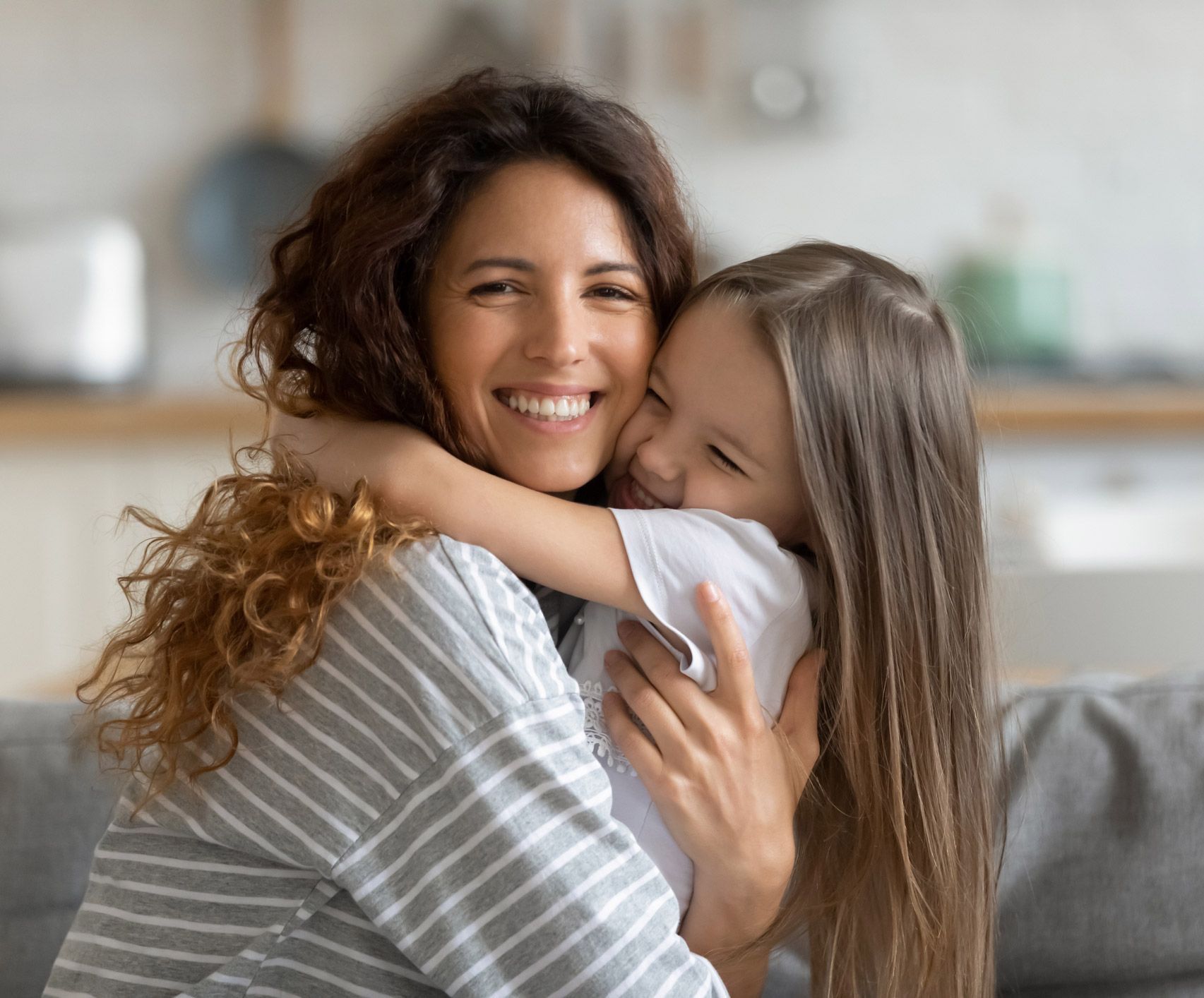 Child Hugging Her Mother — Fairlawn, OH — Susan Lax Law Office Child Hugging Her Mother — Fairlawn, OH — Susan Lax Law Office