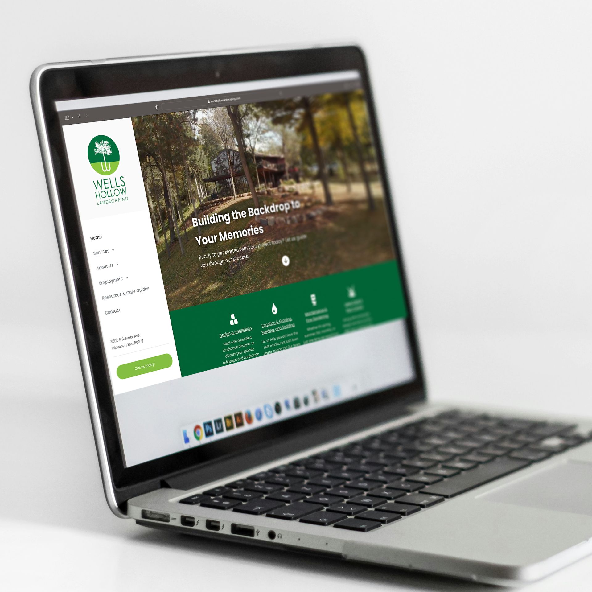 A laptop is open to a website for wells house