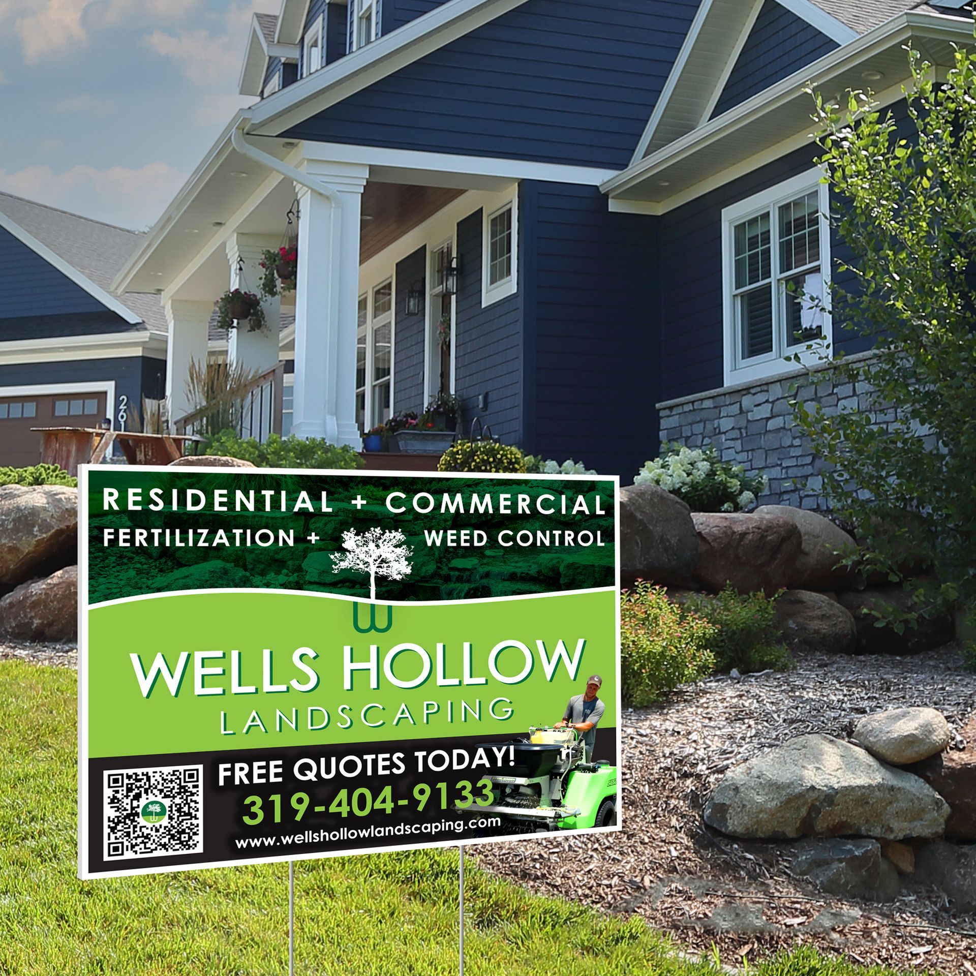 A wells hollow landscaping sign in front of a blue house