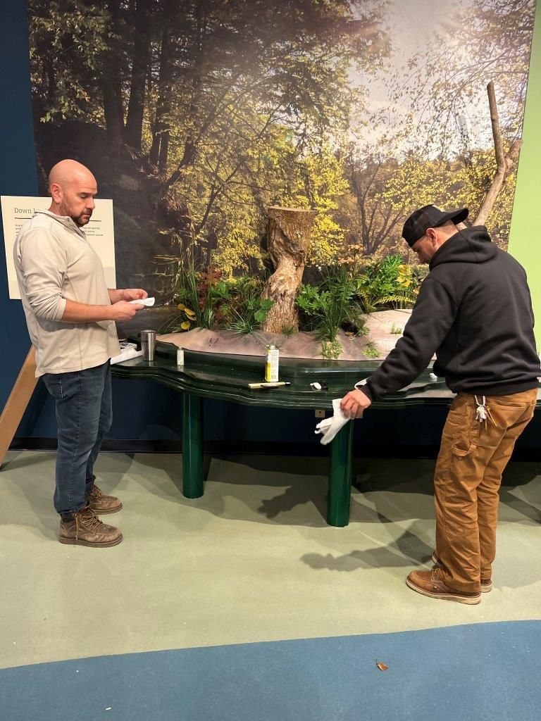 North wall_smell & cat spinner — Arlington Heights, IL — Stevens Exhibits and Displays Inc