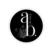 Black circular floral logo with white lowercase “b.” and “floral” text, plus delicate flower line art.