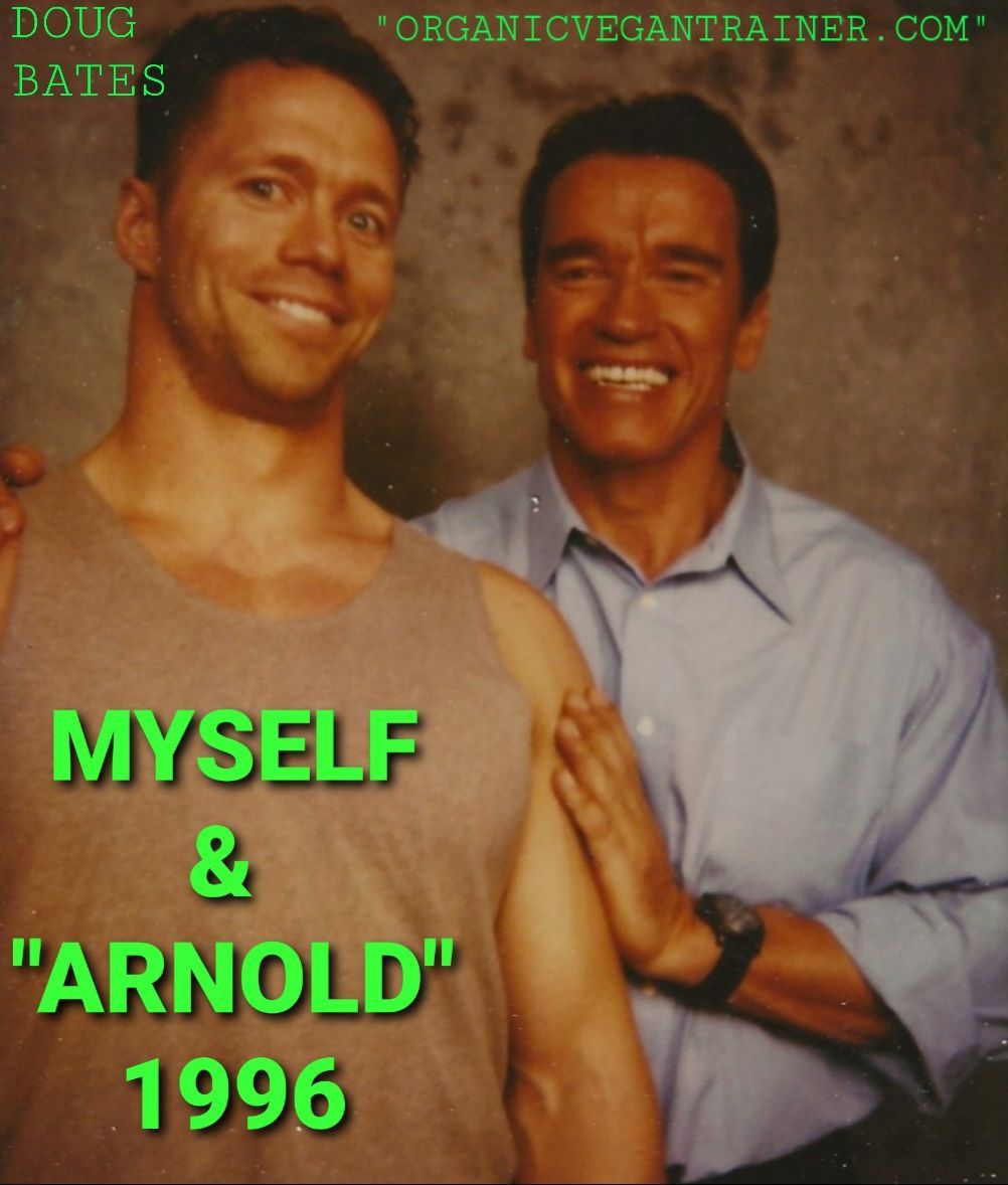 Two men posing for a photo with the caption myself and arnold 1996