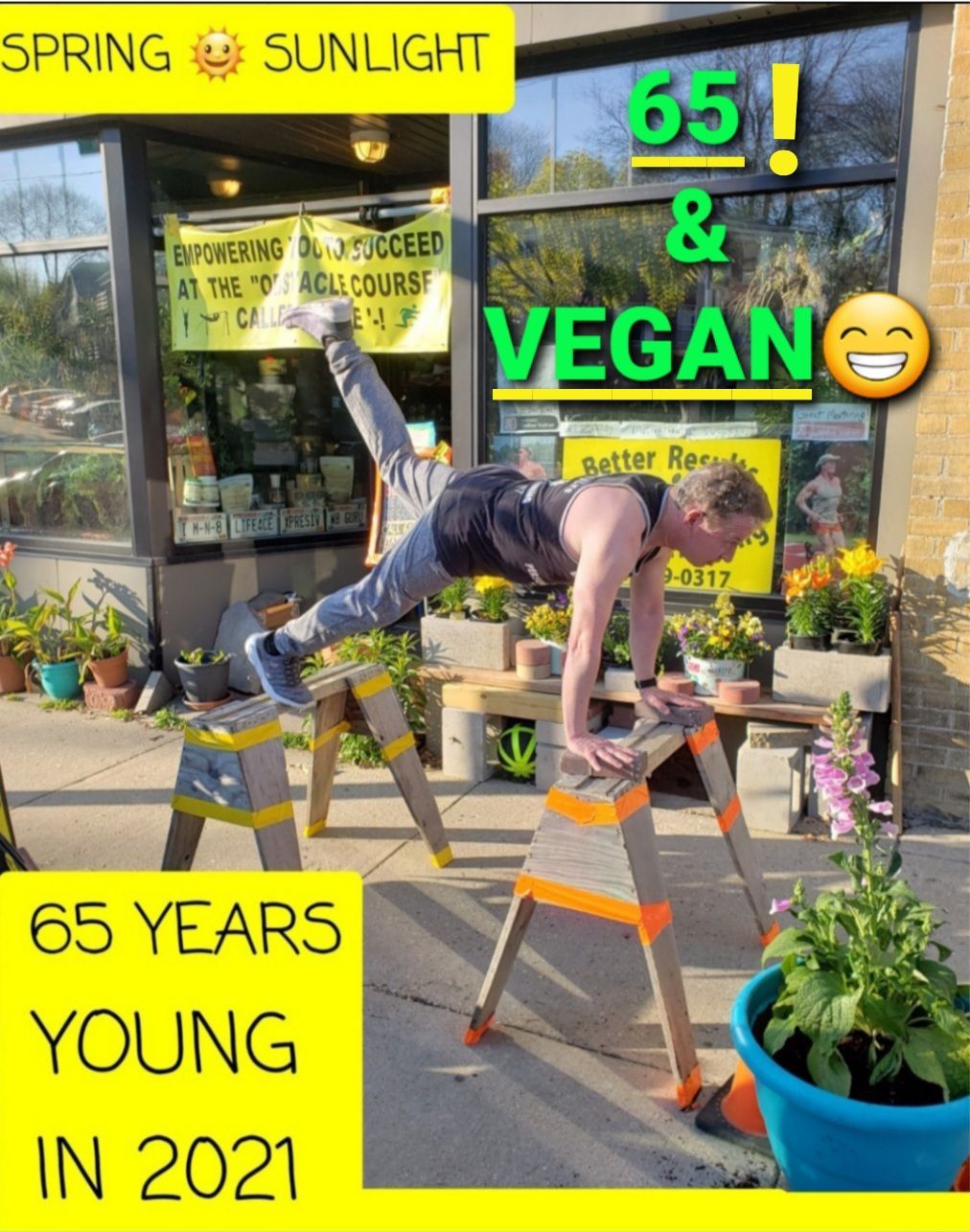A man is doing push ups on a ladder with the words 65 years young in 2021