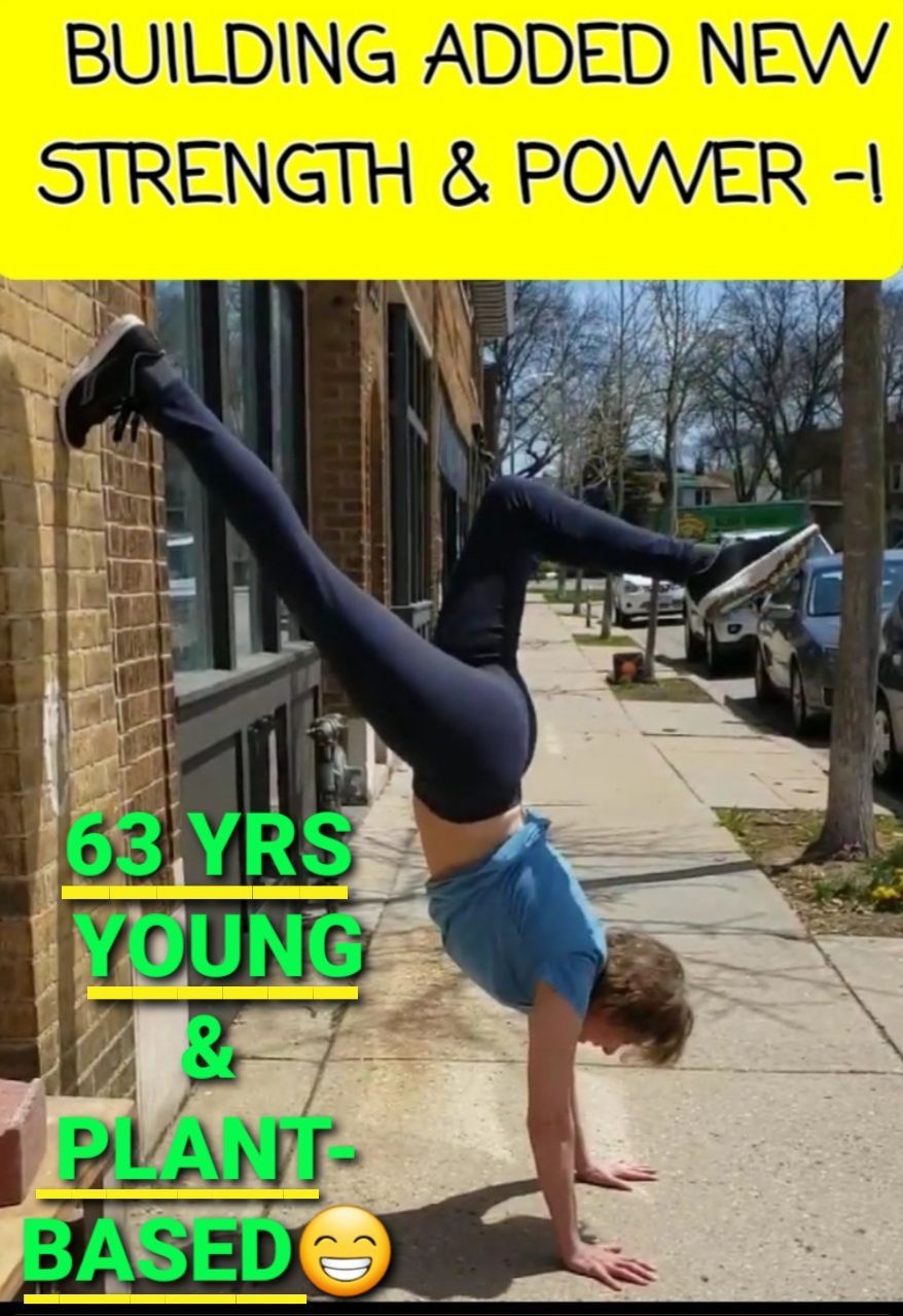 A man doing a handstand on a sidewalk with the words building added new strength & power 63 yrs young & plant based
