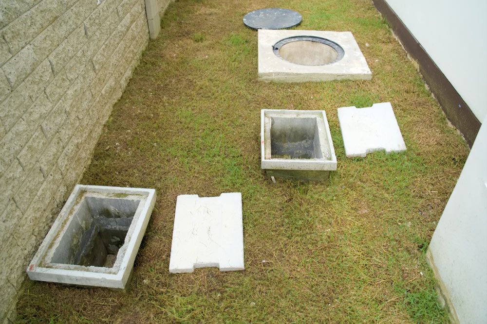 Grease Traps Outside a Residential House