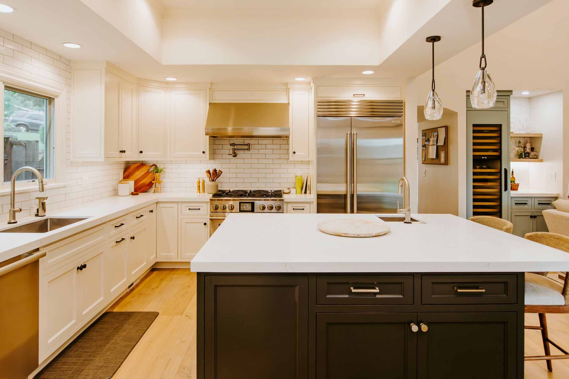 There is a large island in the middle of the kitchen.