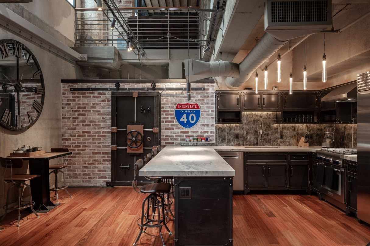 A kitchen with a sign on the wall that says interstate 40.