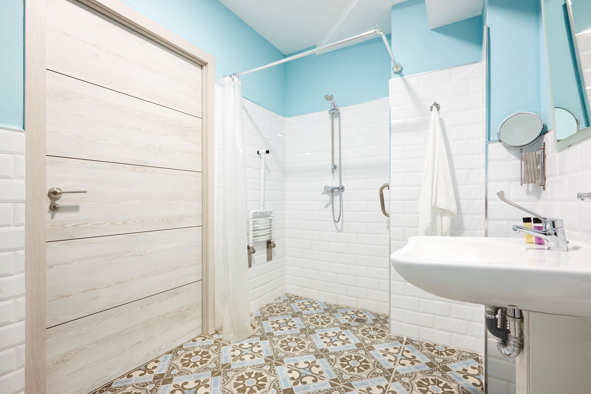 Decorated bathroom adapted for disabled people. Aging in place bathroom design