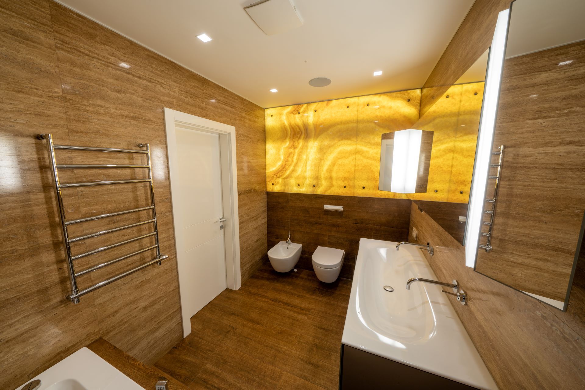 Luxury bathroom vanity. High angle view of the luxury bathroom with wooden walls and floor.
