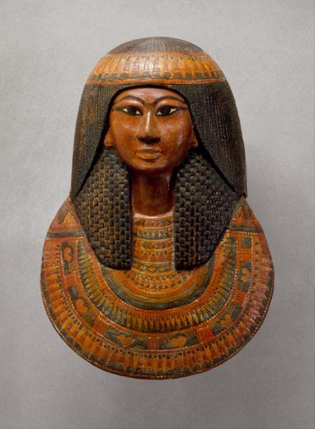 It is a statue of a woman with long hair.