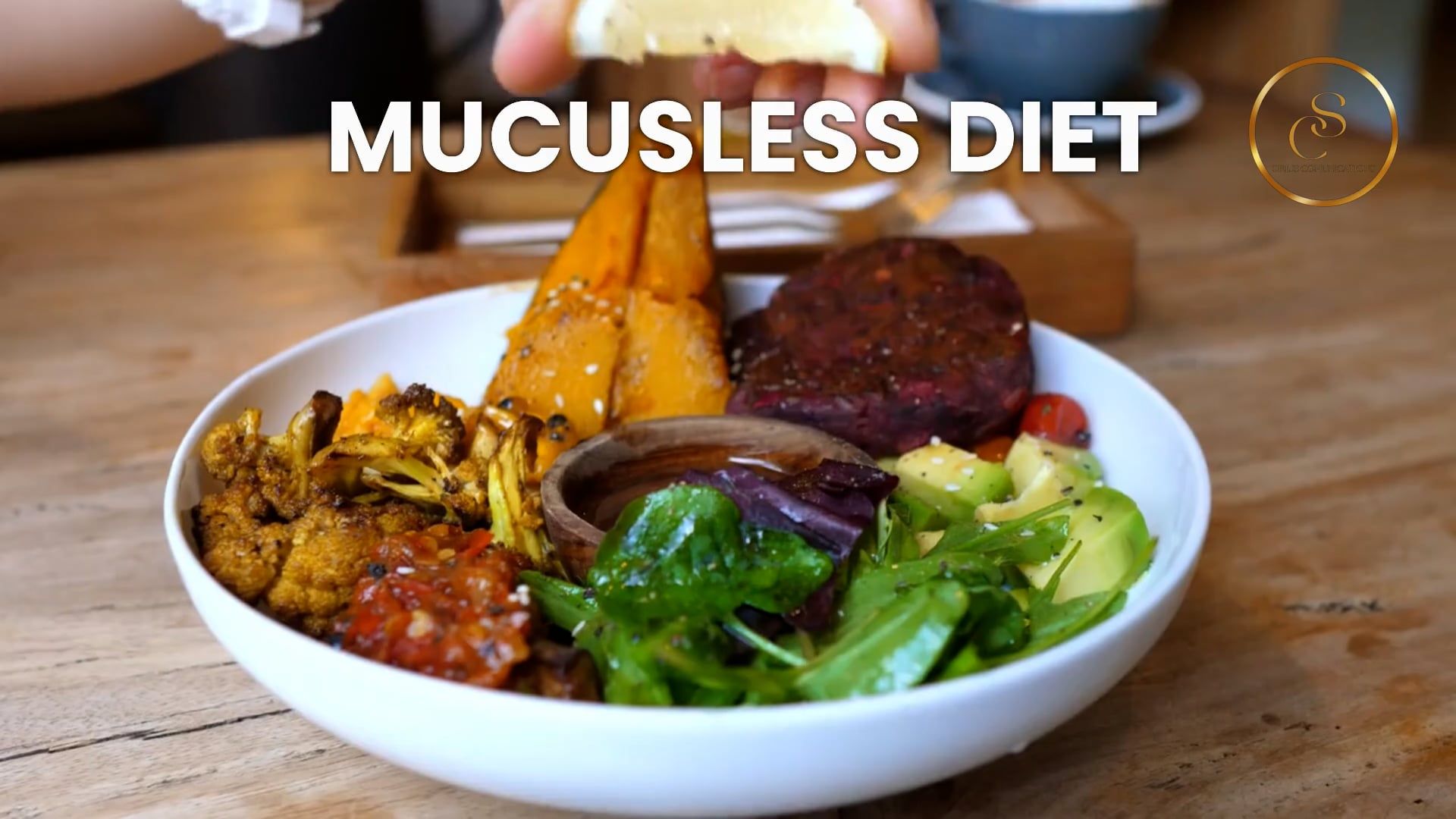 A woman in a white dress is flying through the air in front of a planet.