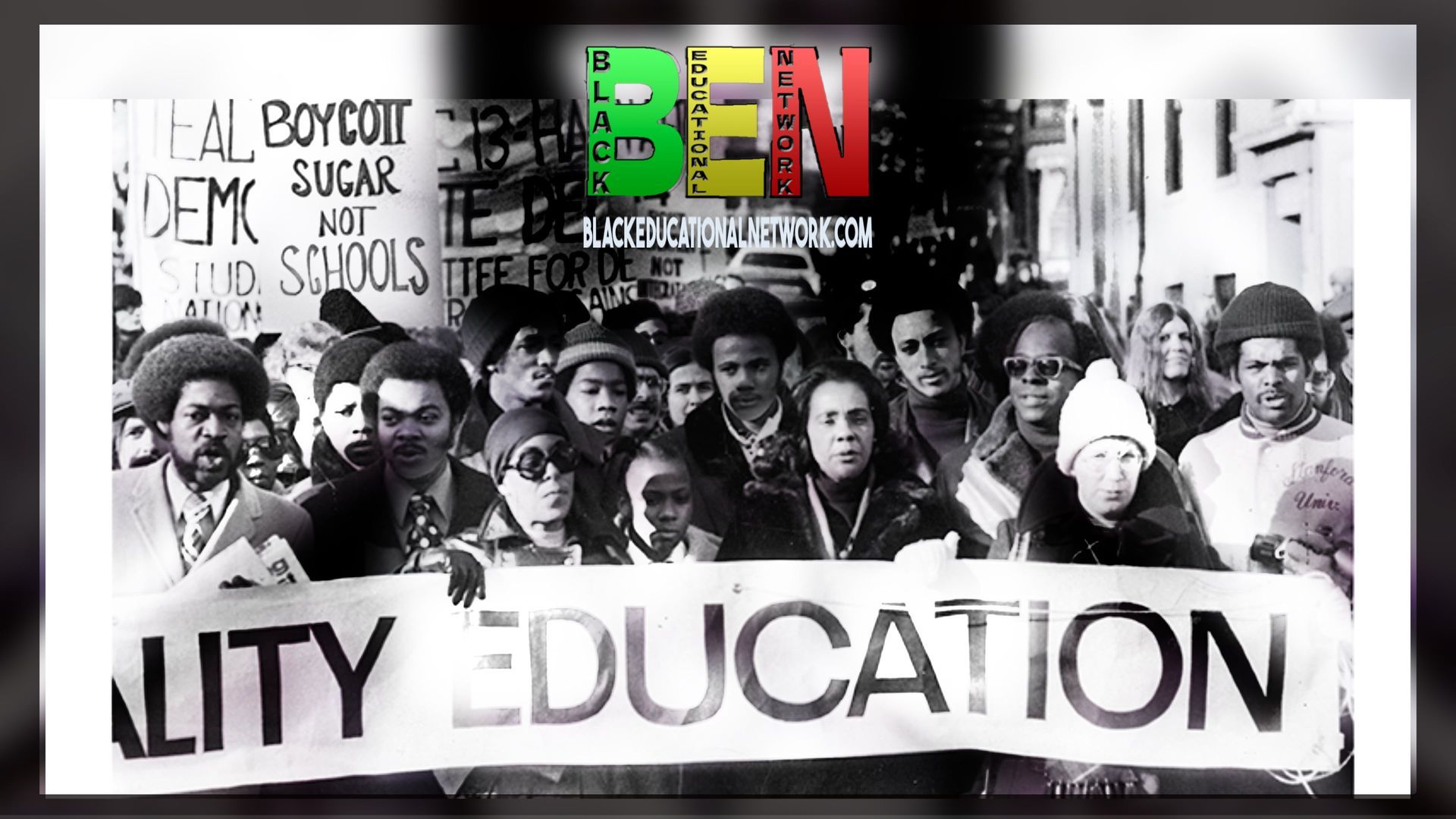 A group of people are holding a sign that says equality education.