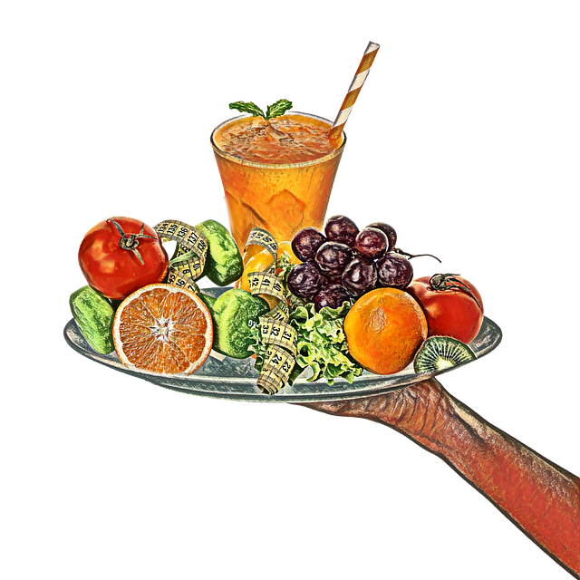 A hand is holding a tray with fruits and a smoothie on it