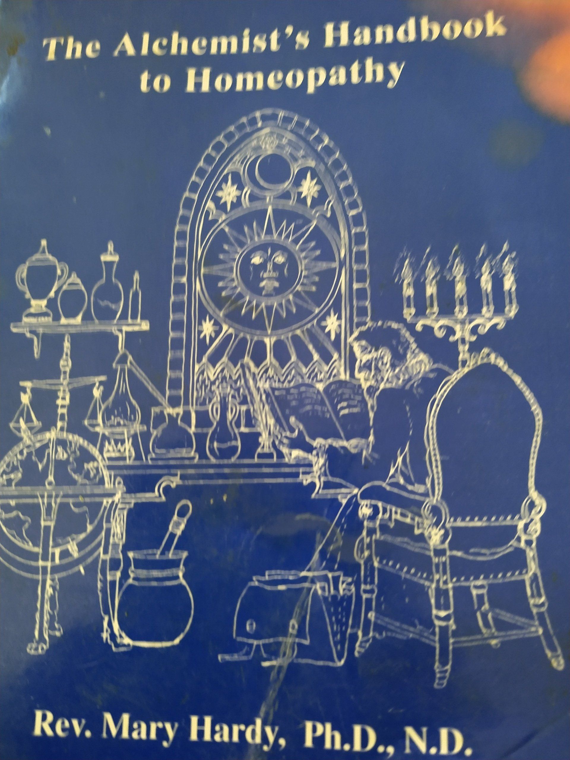 A book titled the alchemist 's handbook to homeopathy