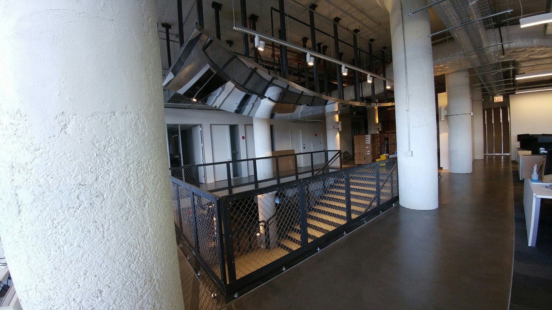 There is a staircase in the middle of the building.