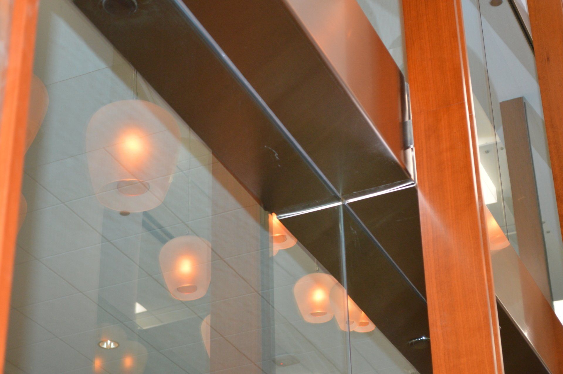 A reflection of lights in a glass wall