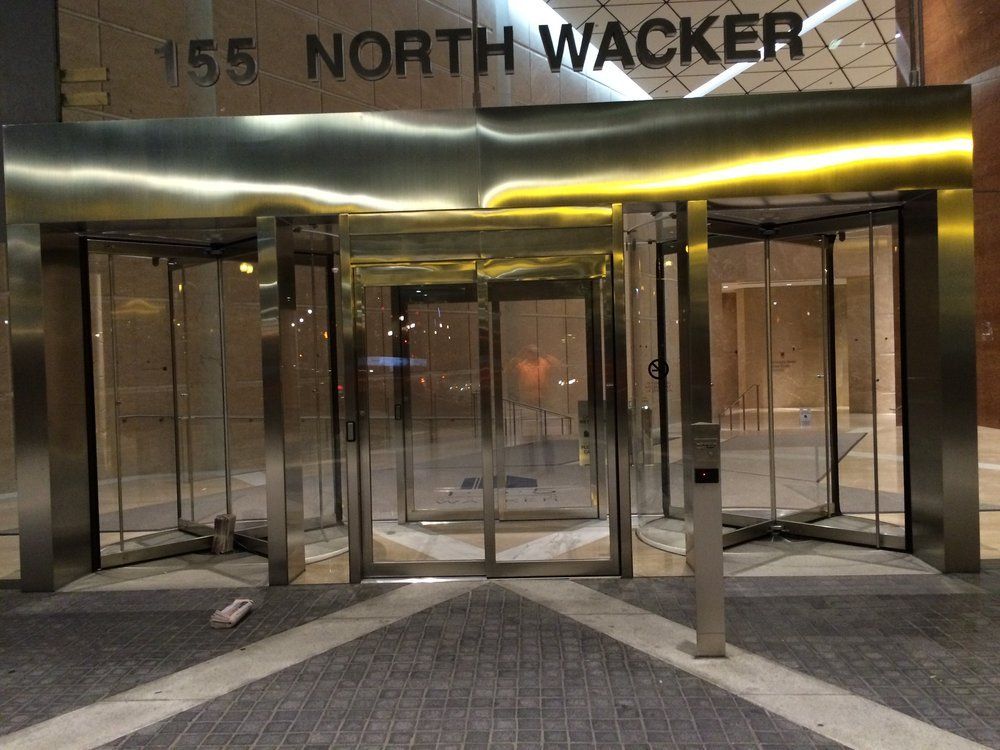 A building with a sign that says 155 north wacker