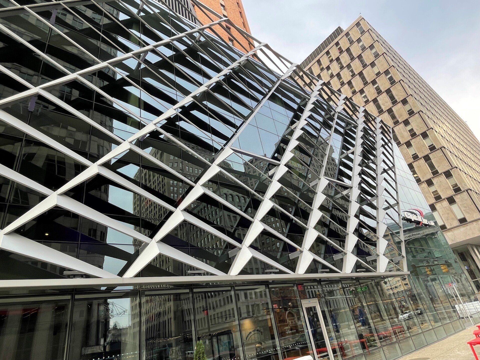 A building with a lot of windows and stairs on it.
