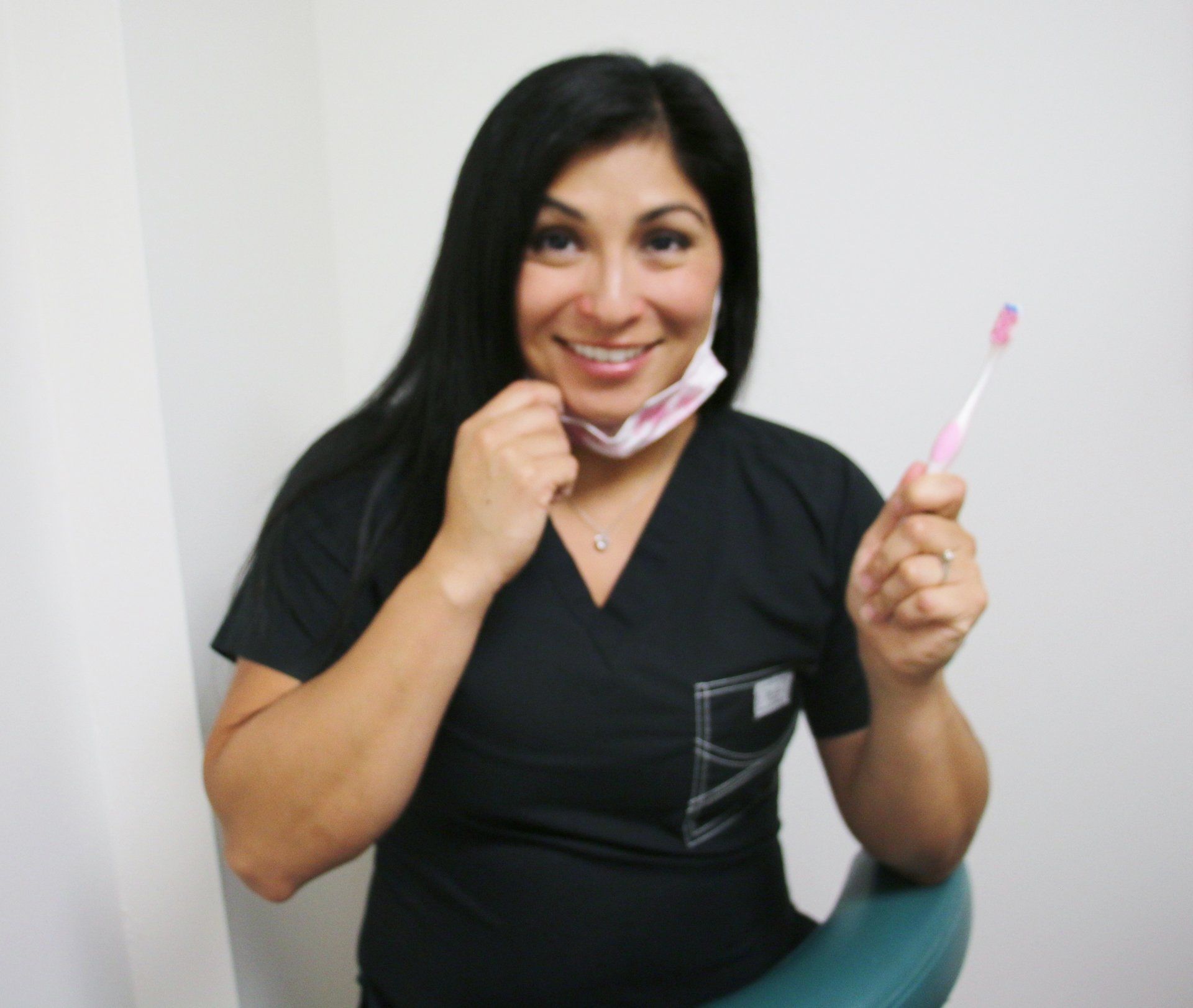 Woman without dental problems thanks to our expert family dentistry in Kailua, HI