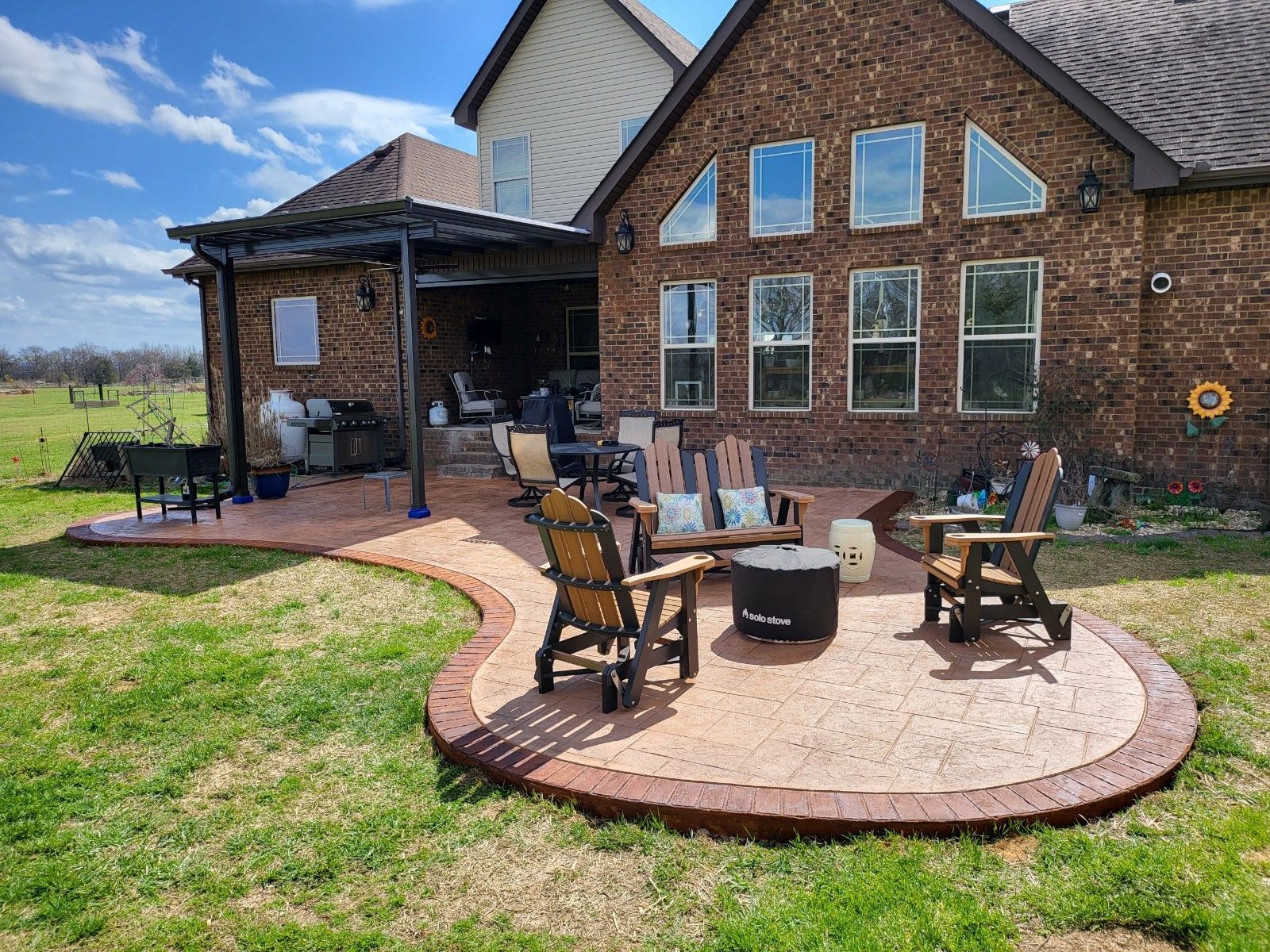 stamped concrete patio pergola motorized shade lebanon tn