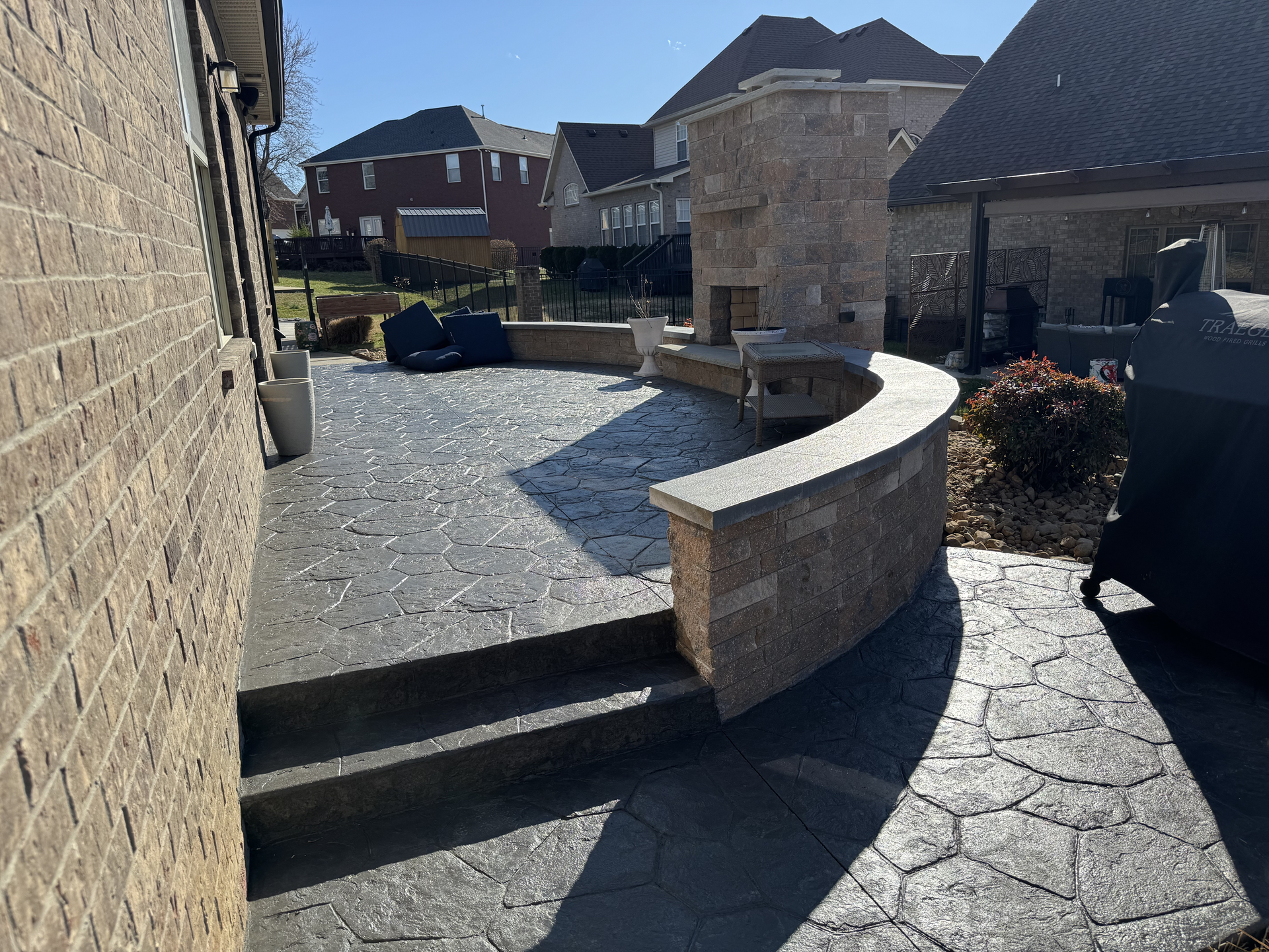 Custom Fireplace and stamped Concrete Patio