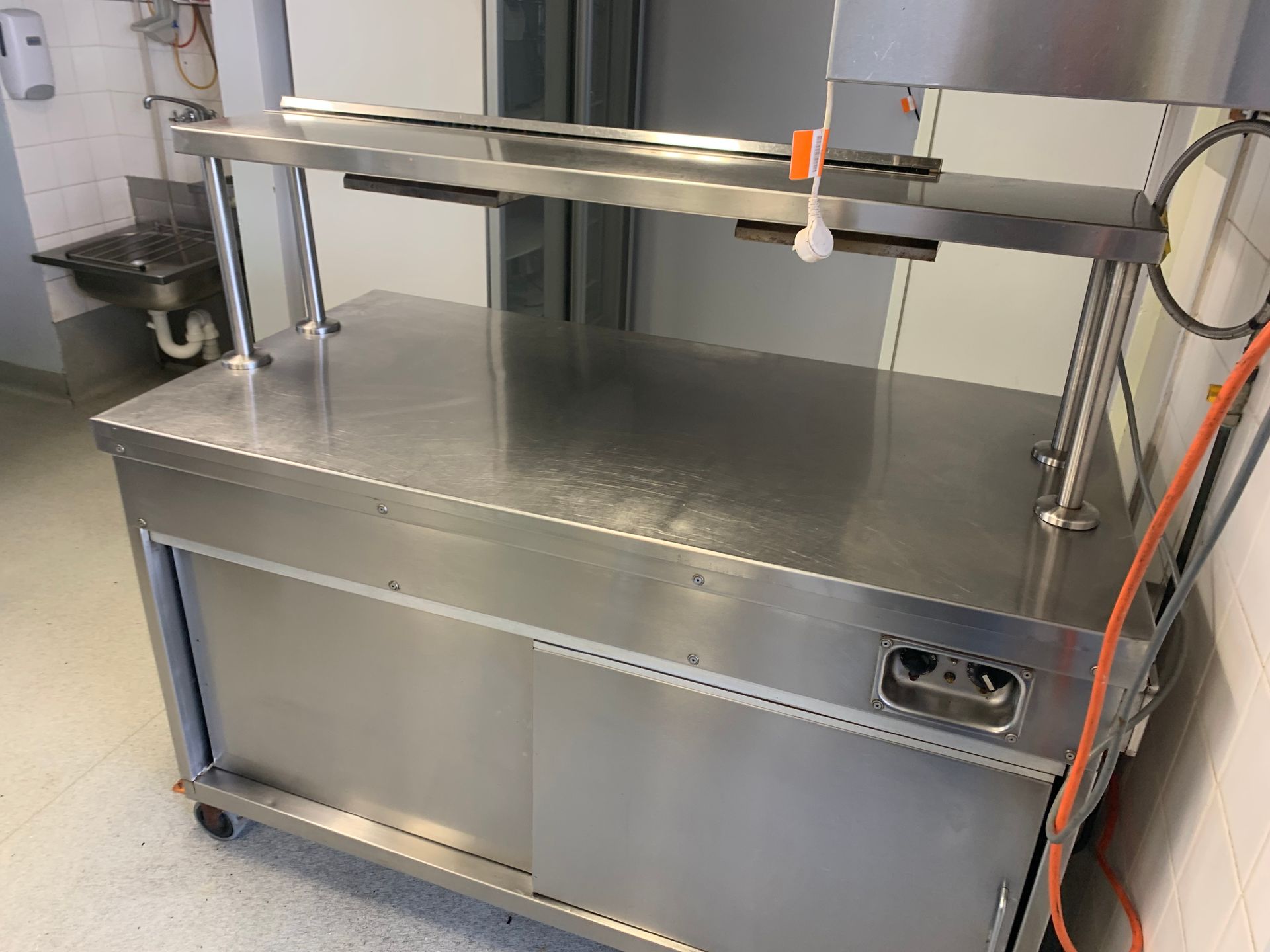 A Frying Pan Is Sitting On Top Of A Gas Stove — DM & MM Services Pty Ltd in Ayr, QLD
