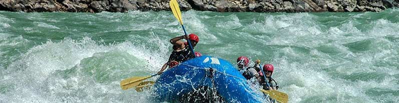 A group of people are rafting down a river.