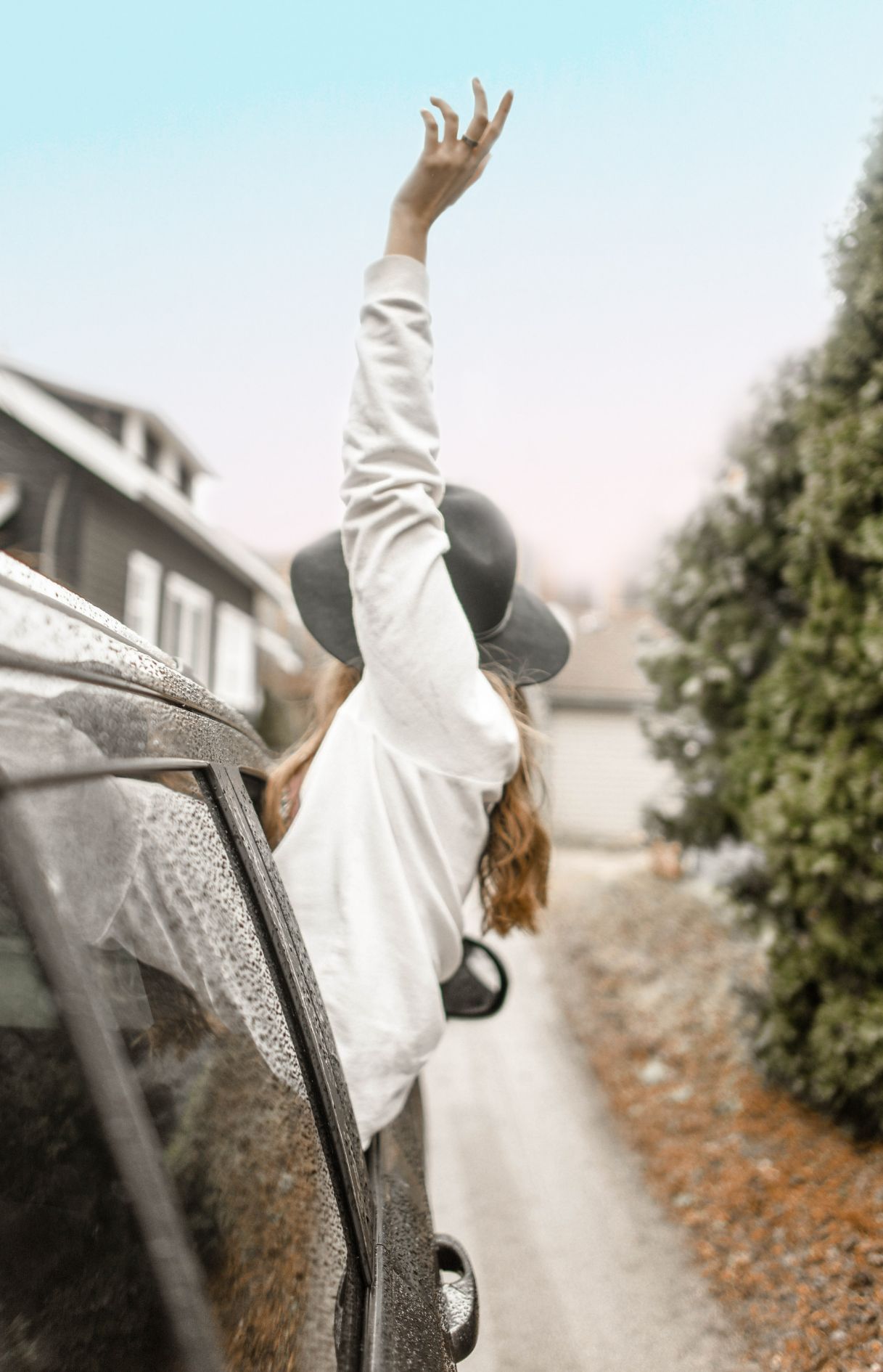 Woman Rising Left Hand on Vehicle Window — Transport in Lake Macquarie, NSW