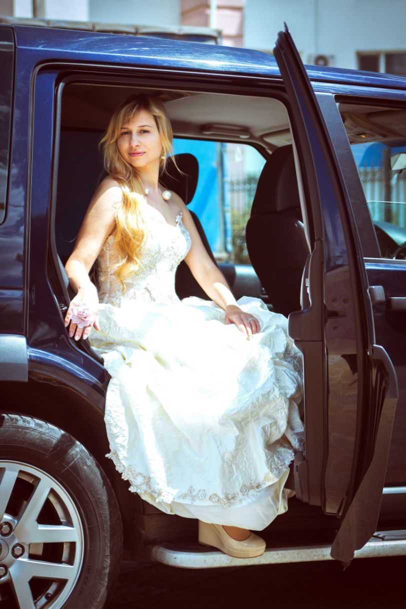 Woman in White Sleeveless Gown Riding car — Transport in Hunter Valley, NSW