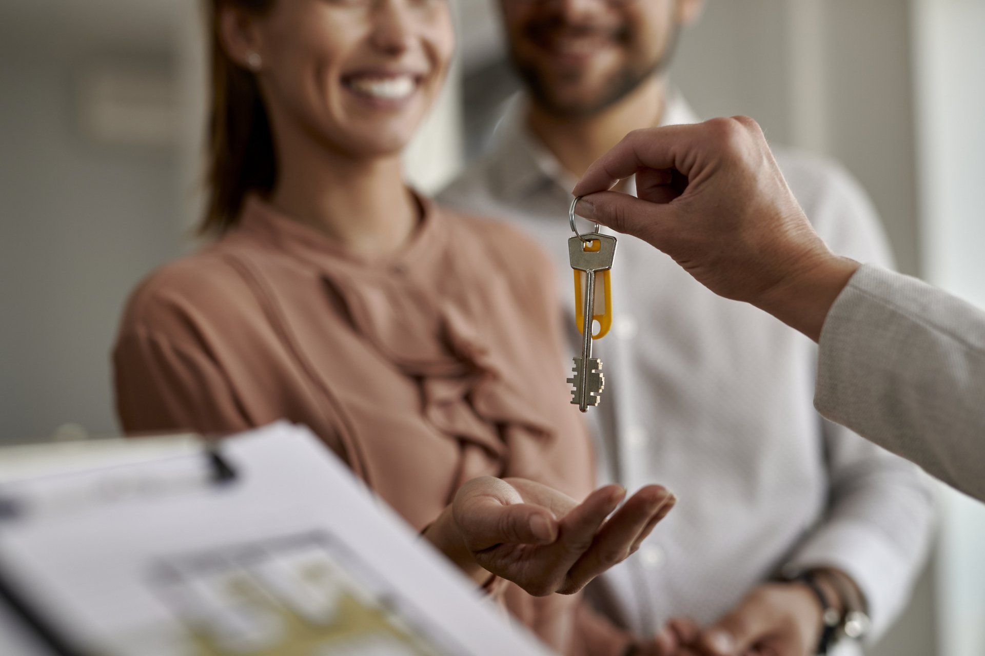 couple getting keys to their home