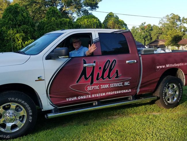 rick waving from new truck