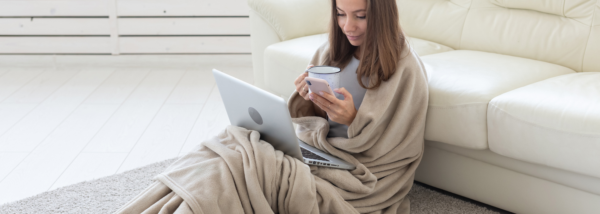 Picture of a woman sitting comfortably at home. 