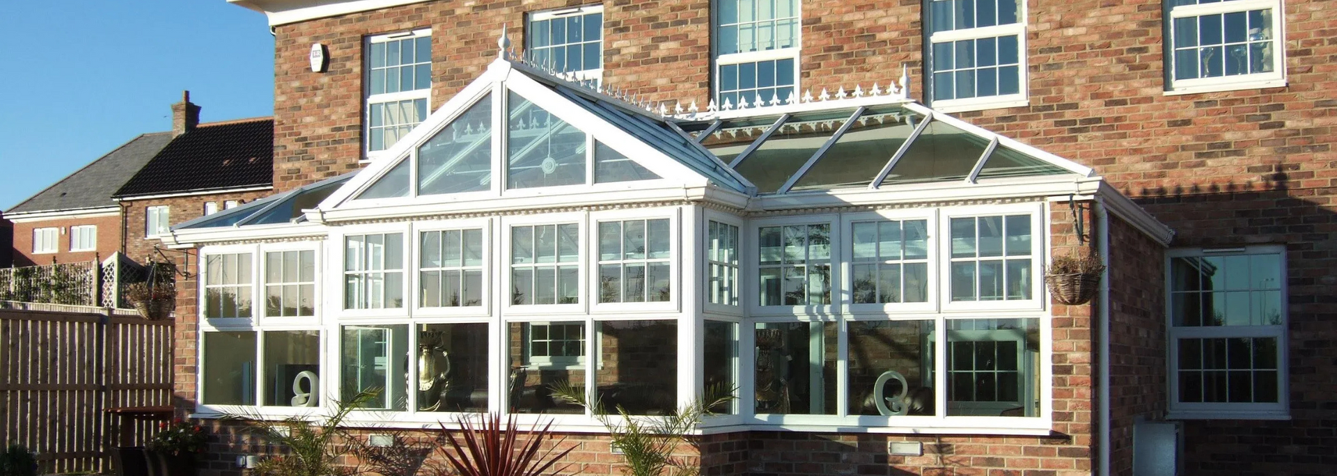 Picture of a new-looking conservatory on a new-looking home.