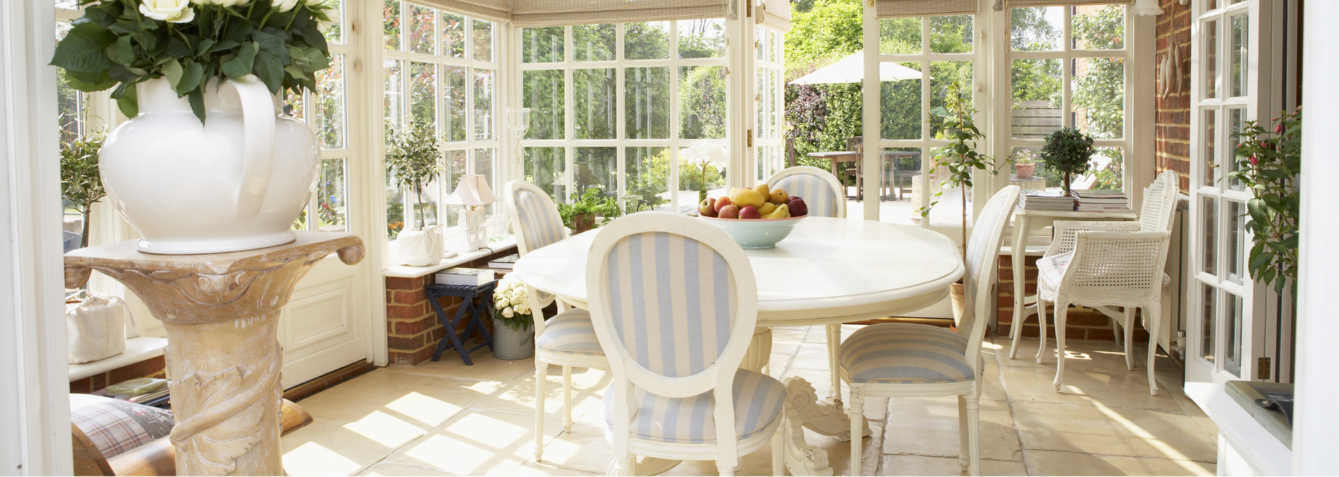 Picture of a conservatory with all-white furniture