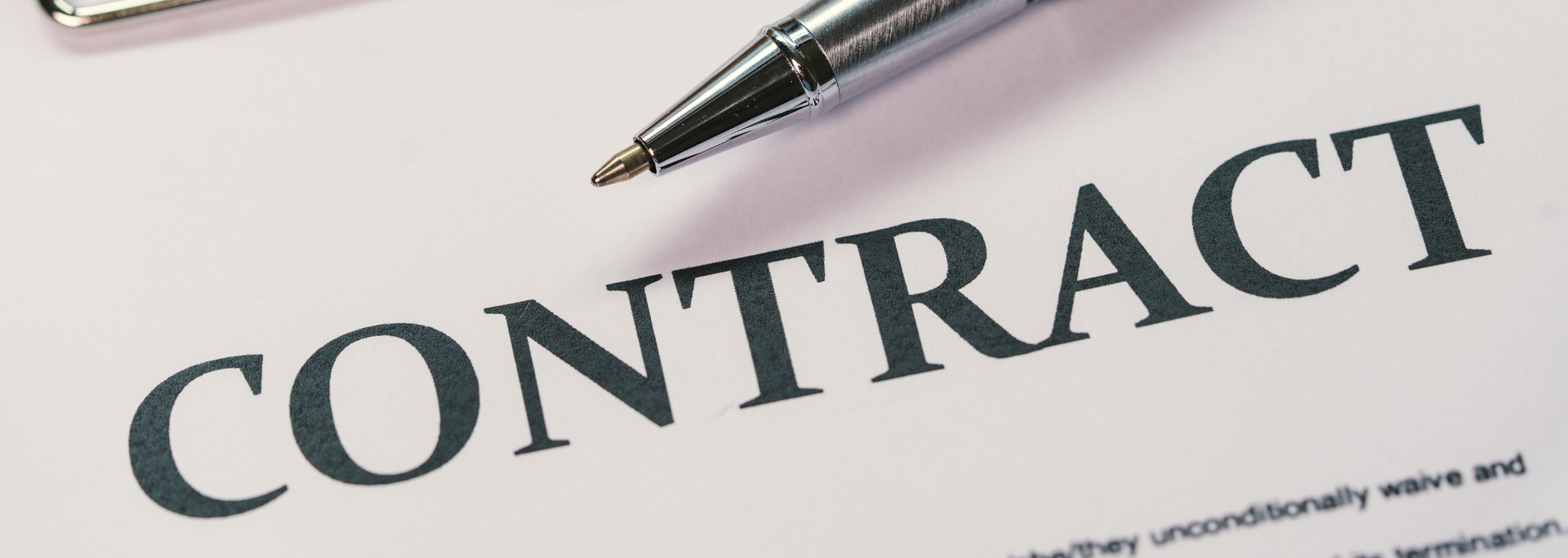 Picture of a contract. Picture of a contract.