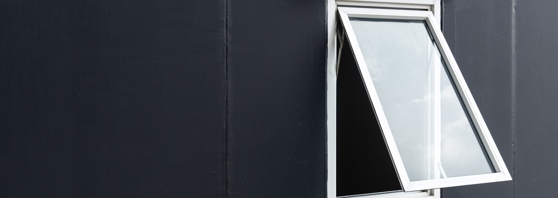 Picture of a top hung casement window. Picture of a top hung casement window.