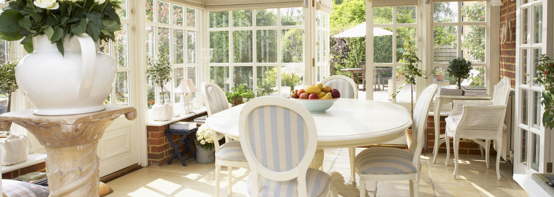 Picture of light-coloured conservatory furniture.
