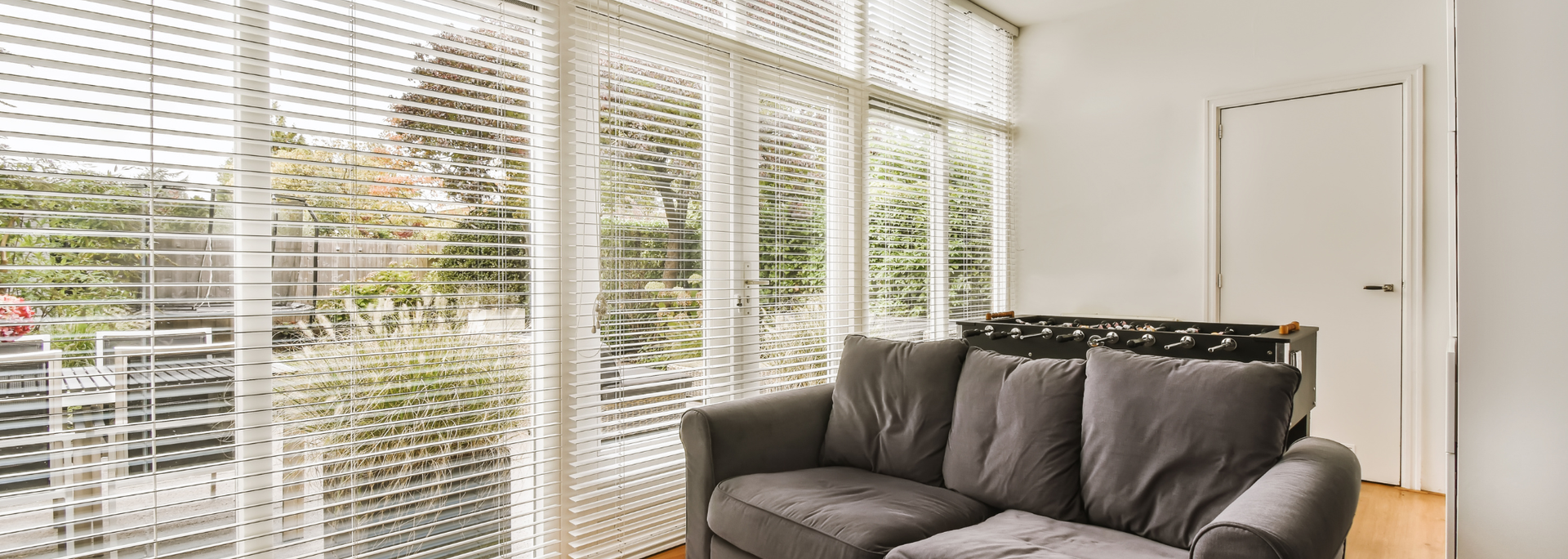 Picture of patio doors with blinds. 