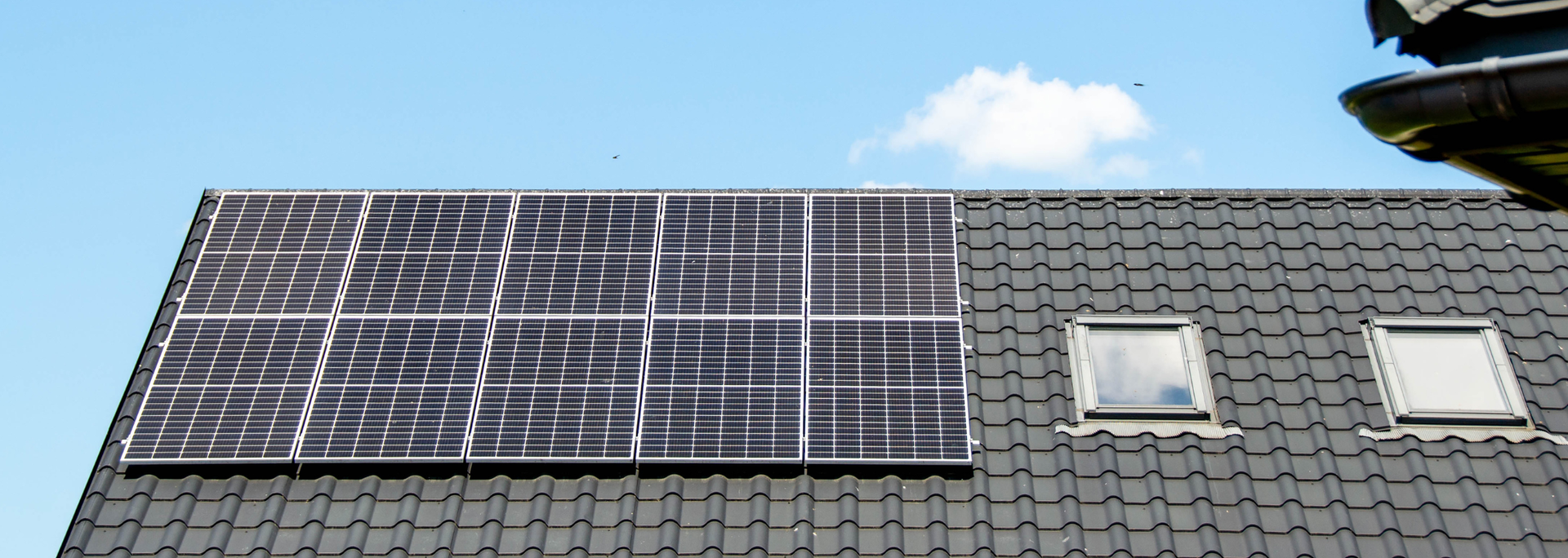 Picture of solar panels on a house roof. Picture of solar panels on a house roof.