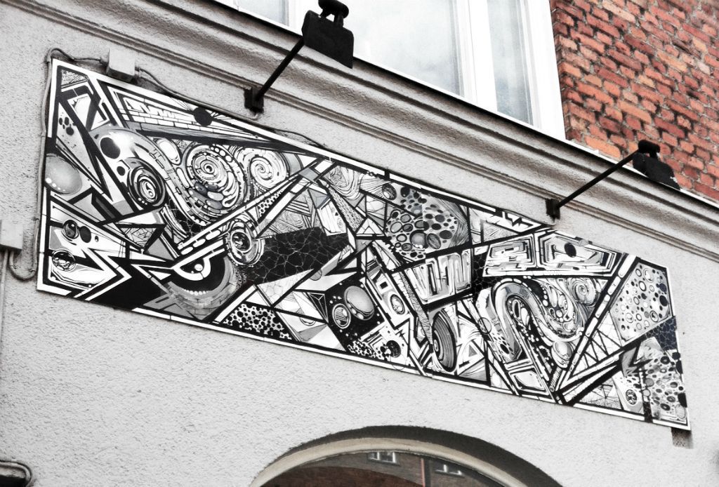 Skylt med abstrakt motiv av Dan Sapunar