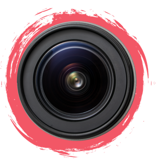A close up of a camera lens in a pink circle