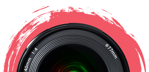A close up of a camera lens with a red circle around it.